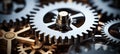 Close up of silver metallic engine gear wheels rotating against an industrial background Royalty Free Stock Photo