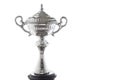 Close up of silver trophy isolated on white background. Winning awards with copy space. Royalty Free Stock Photo