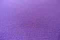 Closeup of simple purple polyester fabric