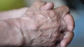 Close-up of sinewy hands of male hands. Hands of a working man pensive.Selective focus. The man folded his arms. Tired hands