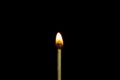 Close up Single matchstick burning isolated on black background