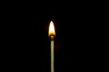 Close up Single matchstick burning isolated on black background Royalty Free Stock Photo