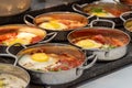 Close up of single servings of shakshuka a traditional Israeli egg dish with tomato