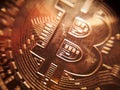 Close up of a single shiny bitcoin coin. Wealth, digital, virtual, currency, and cryptocurrency Royalty Free Stock Photo