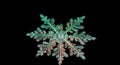 A close-up of a single snowflake displaying intricate, symmetrical hexagonal patterns Royalty Free Stock Photo