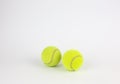 Close-up of two tennis balls isolated on white background Royalty Free Stock Photo