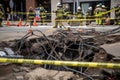 close-up of sinkhole, with ropes and safety gear for rescue workers visible
