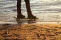 Close-up of the skateboarders feet