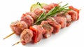 Close-up of skewered meat and veggies on white background Royalty Free Stock Photo