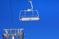 close-up of ski lifts against the background of a blue sky with clouds. Royalty Free Stock Photo