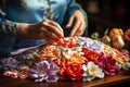 Close-up of skilled hands sewing intricate embroidery - stock photography concepts