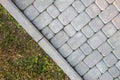 Close-up of slab stone paved path way at park or backyard. Walkway footpath road at house yard garden