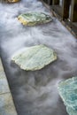 Close-up of slate treads on mist pool