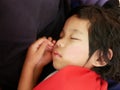 Close up of a sleeping little Asian baby girl, 3 years old Royalty Free Stock Photo