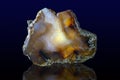 Close up of a Slice Agate Gemstone on dark background Royalty Free Stock Photo