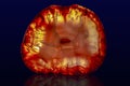 Close up of a Slice Agate Gemstone on dark background Royalty Free Stock Photo