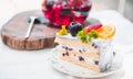 Close up Slice birthday fruit cake in plate violet delicious cream in layer Royalty Free Stock Photo