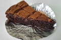 Close up of slice brownie cake on freud paper Royalty Free Stock Photo
