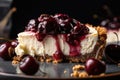 close-up of slice of decadent cheesecake, with cherry and graham cracker crust visible