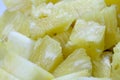 Close up slice pineapple background texture in white dish. Slide and piece of fresh fruit Royalty Free Stock Photo