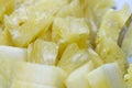 Close up slice pineapple background texture in white dish. Slide and piece of fresh fruit Royalty Free Stock Photo