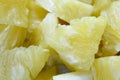 Close up slice pineapple background texture in white dish. Slide and piece of fresh fruit