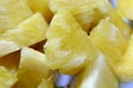 Close up slice pineapple background texture in white dish. Slide and piece of fresh fruit Royalty Free Stock Photo