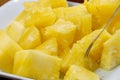 Close up slice pineapple background texture in white dish. Slide and piece of fresh fruit Royalty Free Stock Photo