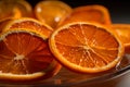 Close Up of Sliced Oranges on a Plate Glass Bowl on Table Royalty Free Stock Photo