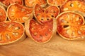 Close up of slices dried bael fruit on wooden background