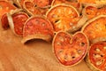 Close up of slices dried bael fruit on wooden background