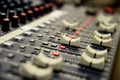 Close up of slider on professional sound mixer. Royalty Free Stock Photo