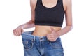 Close up slim woman in old jeans showing thumbs up isolated on w Royalty Free Stock Photo