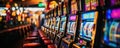 Close-up of slot machines lined up inside a casino, gaming arcade center or slot parlor