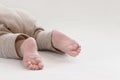 Close up of small baby feet on white background Royalty Free Stock Photo