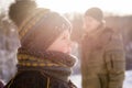 Close-up of small boy in winter sunset outdoors