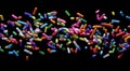 close-up Small colorful sugar candies flying sweet food for toppings, donuts, and cakes at birthday celebrations. isolated on a Royalty Free Stock Photo