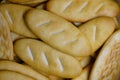 Close-up of small cookies, top view, macro, loaf-shaped