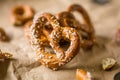 Close Up of Small Crunchy Brown Hard Pretzel on Brown Background Royalty Free Stock Photo