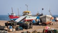 Close up of small fishing boats moored by beaching on shingle beach at Beer in Devon, UK