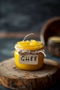 Close-up a small jar with ghee butter with inscription \