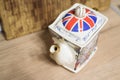 Close up of small porcelain English teapot Royalty Free Stock Photo