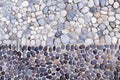 Small stone texture decorative on concrete wall gray blue white black background Royalty Free Stock Photo