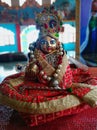 Close up of small structure of Lord krishna in India. Royalty Free Stock Photo