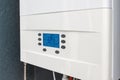 Close up of smart control panel of gas boiler for winter home heating and hot water. Modern house device Royalty Free Stock Photo