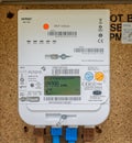Close up of a smart electricity meter in wall mounted outside box in Chapmanslade, Wiltshire, UK Royalty Free Stock Photo