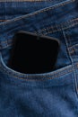 Close Up Smartphone in blue Jeans Back Pocket Bussines Fashion Stylish Screen Copy Space gadjet Royalty Free Stock Photo