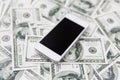 Close up of smartphone and dollar money Royalty Free Stock Photo