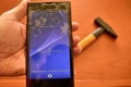 Close up on a smartphone screen with a broken screen