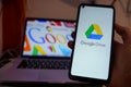 A close-up of a smartphone screen displaying the official Google Drive logo and cloud storage interface. Royalty Free Stock Photo
